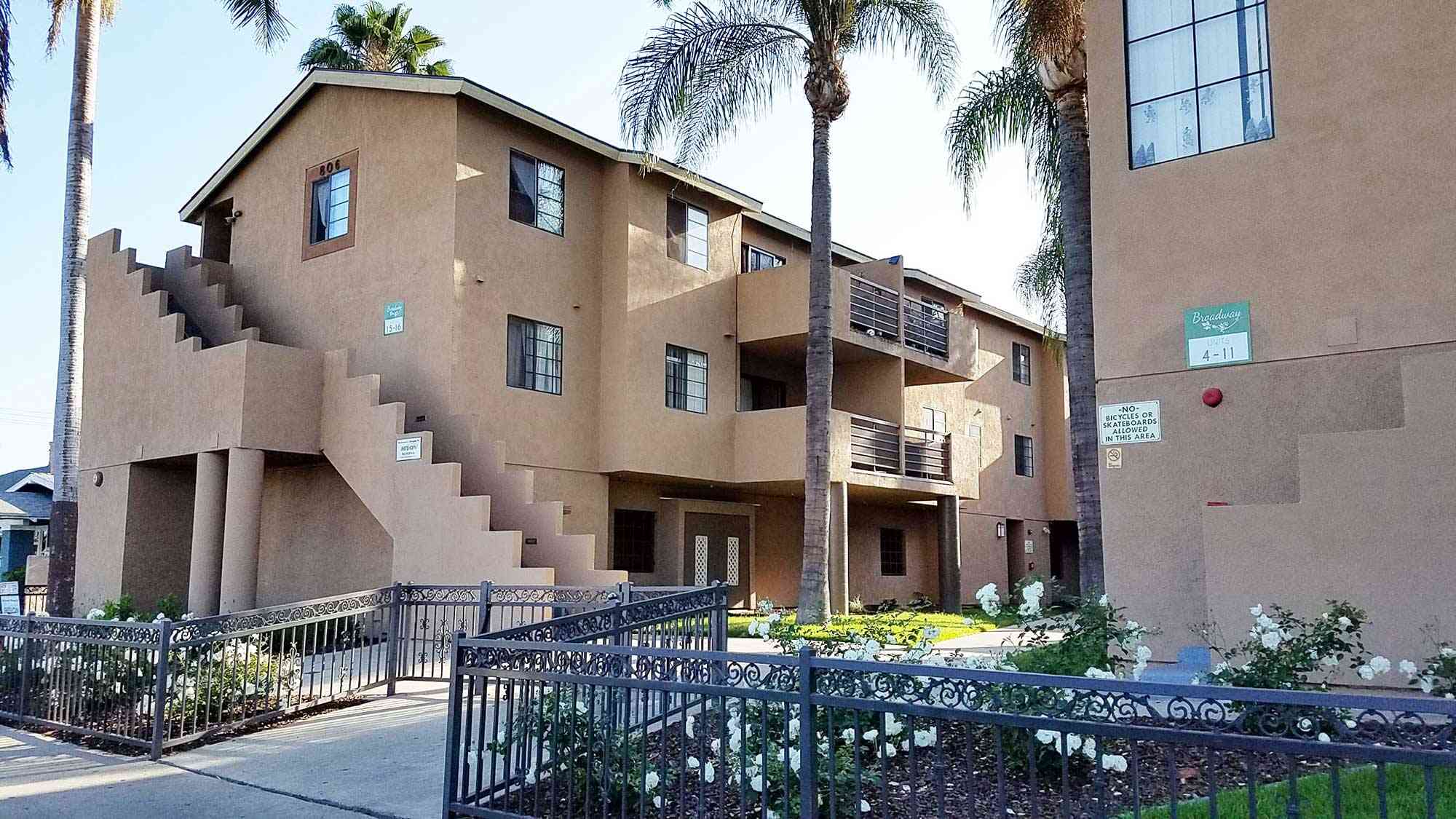 exterior building facade with palm trees