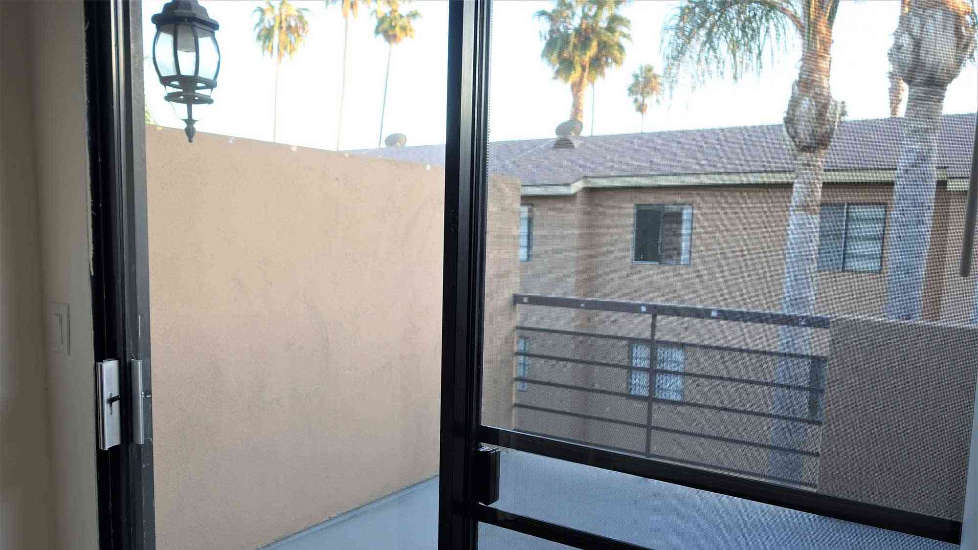 view from sliding glass door to private balcony