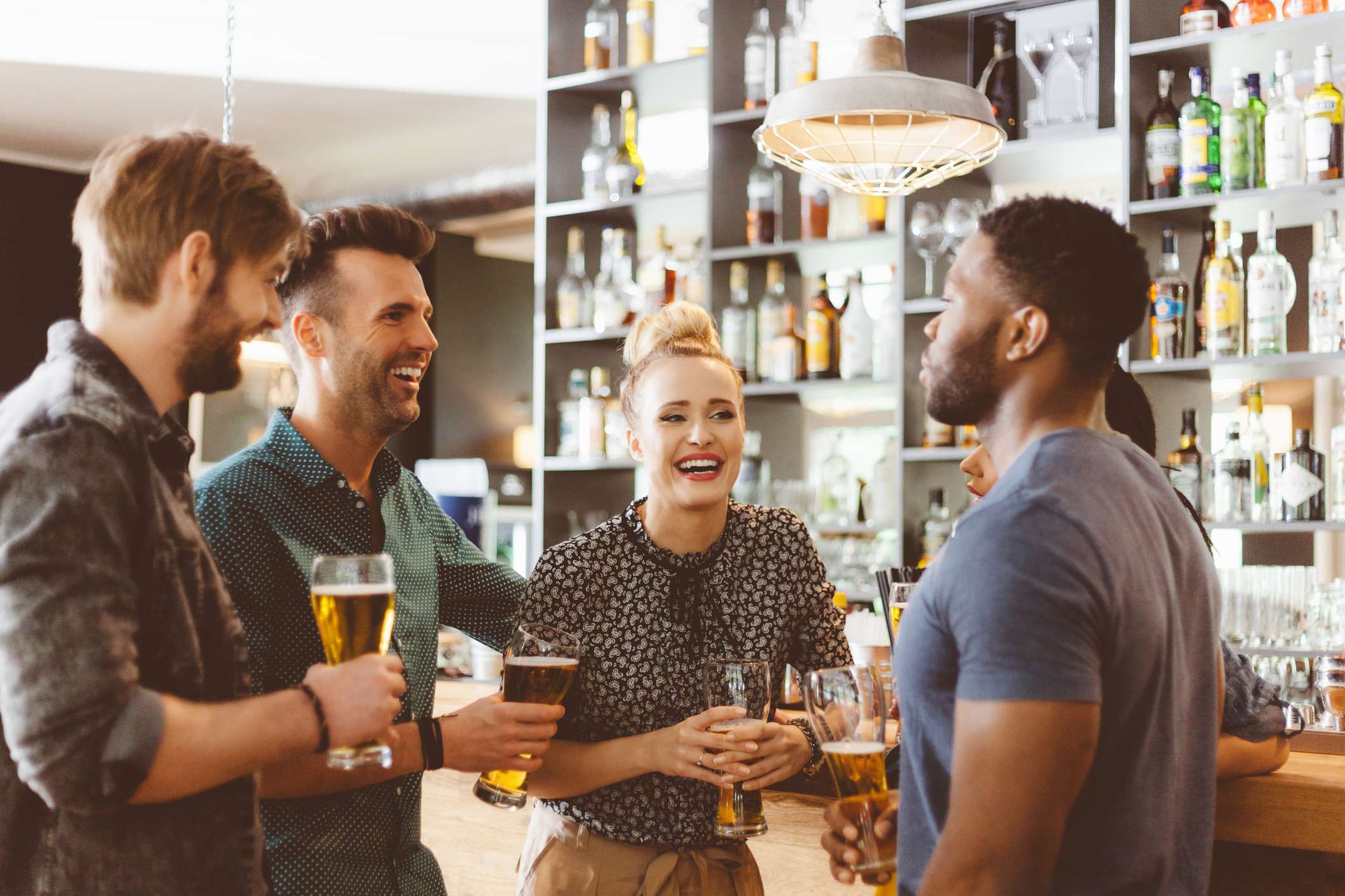 Group of friends at a bar having drinks