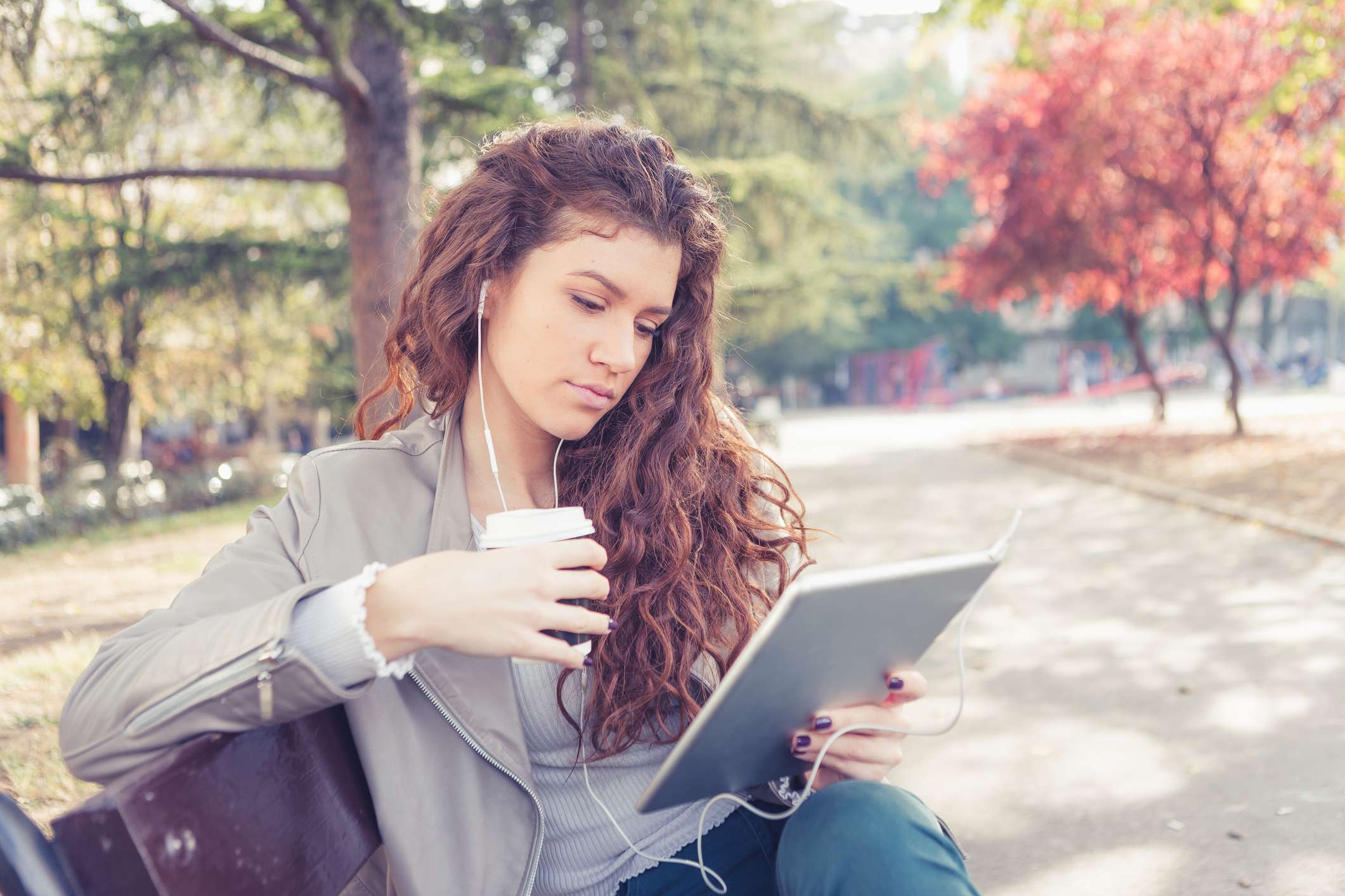 Woman sitting on a bench at the park